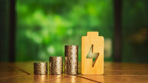 a,pile,of,coins,and,an,electricity,symbol,,it,is