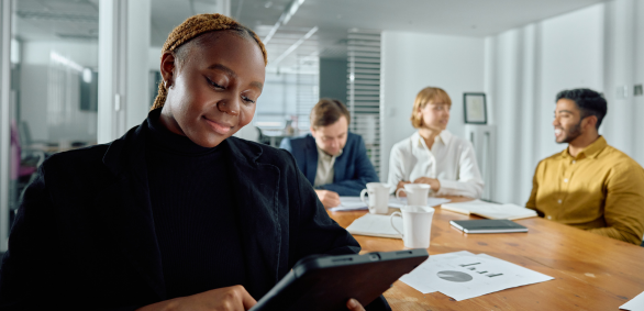 Business meeting with diverse team in office.