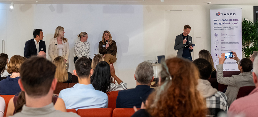 Panel discussion at a business conference event.