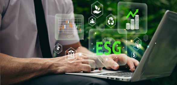 Person working on laptop with ESG icons.
