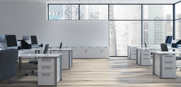 Modern empty office with city view windows.