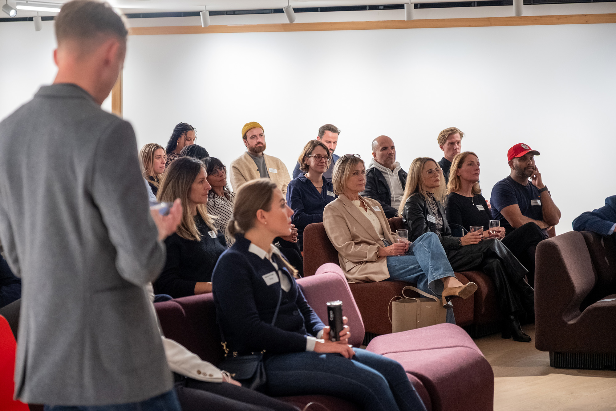 Audience attentively listening during a presentation.