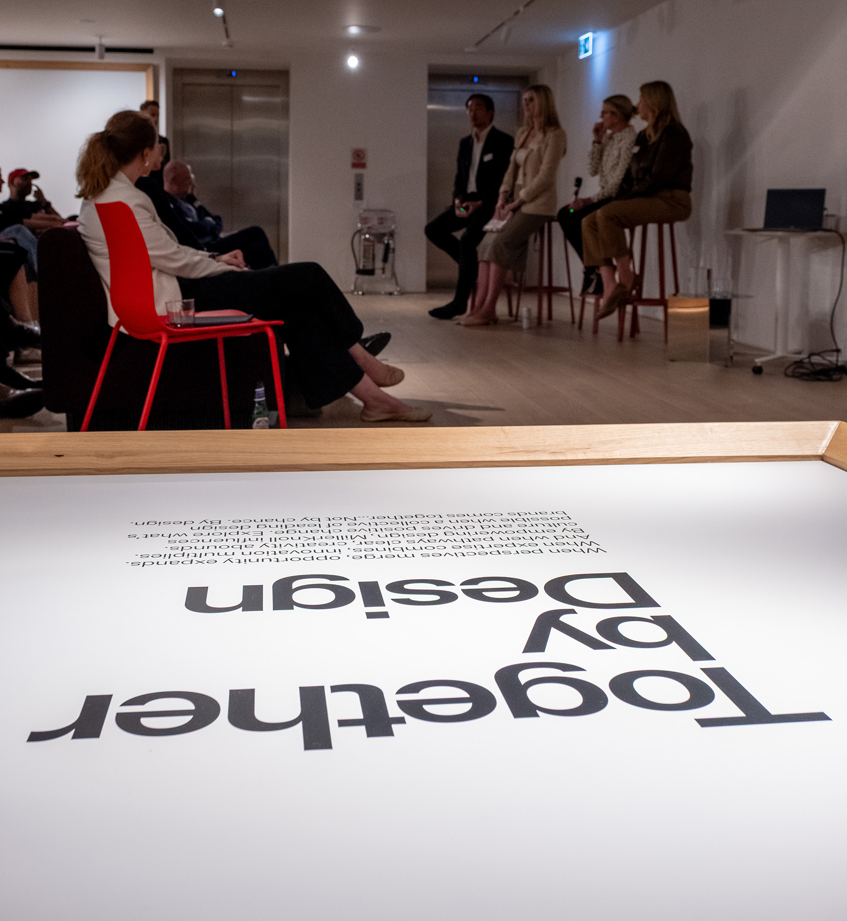 People in discussion at design event